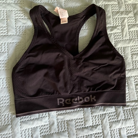 Reebok and Puma top. - Picture 10 of 13